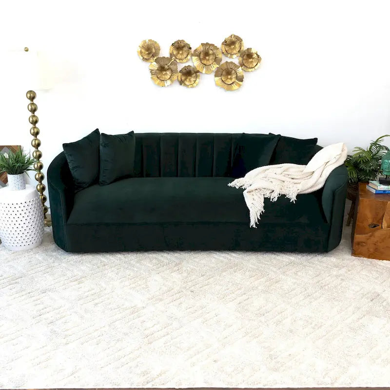 Canapé en velours vert au dossier droit, style moderne
